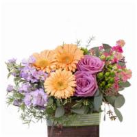 Blooming Wild (Shown As Deluxe)) · This delightful bouquet is sure to captivate! Filled with gorgeous peach gerberas, lavender ...