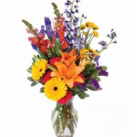 Vibrant Meadow Flower Arrangement · These bright and colorful flowers make a wonderful gift! This joyful design features orange ...