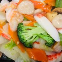 Seafood Delights · Fresh shrimp, scallop,crab meat  sautéed with assorted Chinese vegetables.