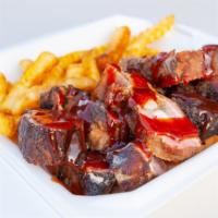 Rib Tip Basket · 10 Smoked Rib tips with fries and drink.