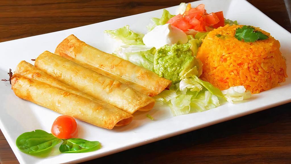 Taquitos · Three rolled tortillas stuffed with beef or chicken, served with lettuce, sour cream, guacamole, tomatoes, rice or beans.