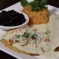 Loco Pepe'S · One burrito filled with your choice of meat: grilled chicken, steak or pork, cilantro, chopp...