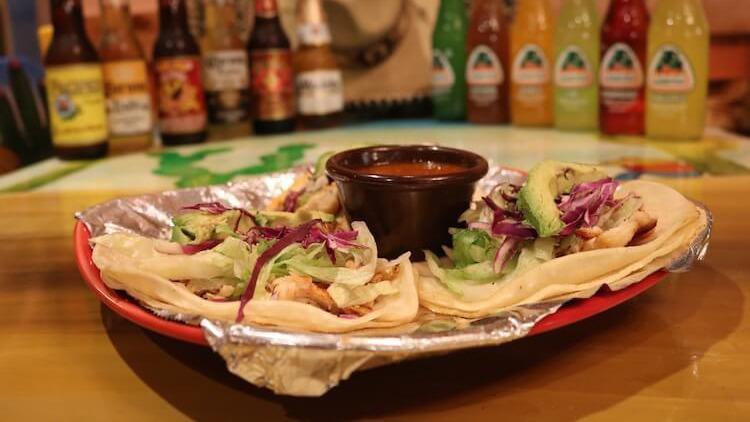 Tacos · Your choice of (3) ground beef or chicken tacos, topped with lettuce and cheese.