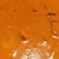 Chicken Tikka Masala · Boneless pieces of chicken cooked in hot tomato base and flavored with fresh Indian herbs.