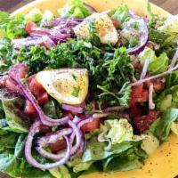 Green House Salad · Lettuce, tomatoes, onions, parsley tossed in a lemon vinaigrette dressing.