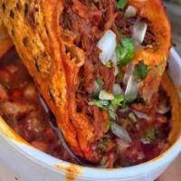 Dippin Tacos · Three quesa birria tacos with consome. Braised Beef or Chicken. Cheese blend, onion and cila...