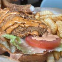 Po'Boy (Fried Shrimp, Catfish, Or Philly Steak) · Fried Shrimp or Catfish with lettuce, tomato, and Remoulade on French roll. Philly Steak wit...