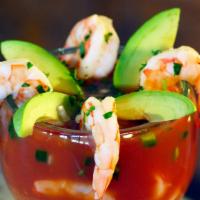 Coctel De Camarón * · A rich and delicious version of a shrimp cocktail garnished with onions, avocado and jalapeñ...