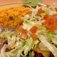 Flautas Doraditas · Three flute-shaped tacos fried to golden crispness with your choice of shredded beef or chic...