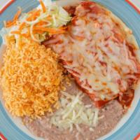 Enchiladas Rojas De Queso · Three rolled-up corn tortillas stuffed with cheese and topped with mild red sauce. With stea...