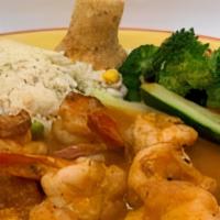 Camarones A La Diabla · Shrimp sautéed in a very spicy tomato sauce. Served with white rice, steamed vegetables and ...