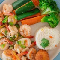 Camarones Con Naranja Y Tequila · Shrimp with orange and tequila. This delicious dish has an orange-and-jalapeño sauce for a t...