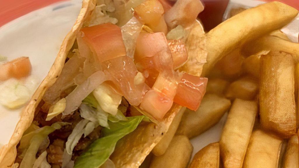 Kid'S Taco · Hard or soft shell with ground beef or chicken. Served with french fries or Spanish rice and beans. With steak for an additional cost.