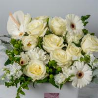 In The Clouds · An elegant statement of white floral with the perfect touch of greens. Exact color and flowe...