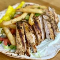 Detroit Fry Shawarma  · Fries in the Pita, Grilled White Meat Chicken, Garlic, Pickles, Lettuce , Tomatoes and Pickl...