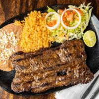 Carne Asada · Arrachera marinated to perfection with our blend spices. Served with tortillas, rice and bea...