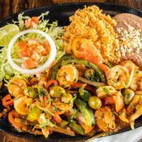 Camarrones Ala Veracruzana · Perfectly grilled shrimp topped with tomato, onions, olives, and bell peppers Served with to...