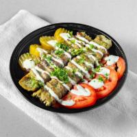 Chicken Kabab Bowl · Basmati rice topped with grilled to perfection ground chicken kebab, tomato, pickles, and dr...