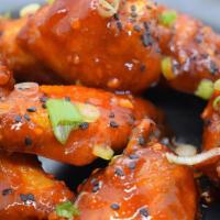 Sweet & Spicy Korean Wings · Garlic marinated, deep fried, tossed in a sweet & spicy korean pepper sauce.