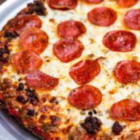 Thin Crust Meat Lovers · Sausage, pepperoni, bacon & ground beef.