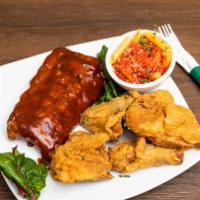 4 Piece Broasted Chicken And Half Slab Of Ribs · Includes side salad and one side