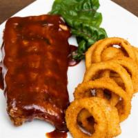 Full Slab Ribs · Includes side salad and one side