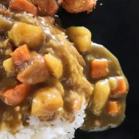 Katsu Curry Rice · White rice with Japanese style mild curry pork cutlet.