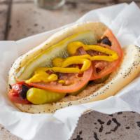 Classic Chicago Dog · Vienna All-Beef Dogs, poppyseed bun and the proper condiments.