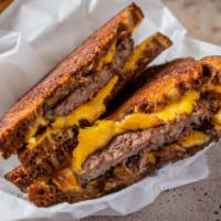 4 Oz. Patty Melt · Marble rye, American cheese and grilled onions.
