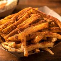 Cajun Fries · Our fresh-cut fries tossed with Cajun spices.