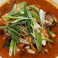 Spicy Seafood Udon Soup · Vegetables and Seafood in House Special Spicy Soup with Thick Flour Noodle