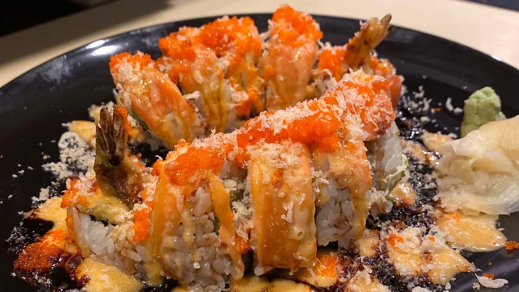 Thunder Roll  · Tempura shrimp,avocado,cream cheese top with bake salmon,spicy mayo,sweet sauce,masago,tempura flakes