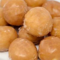 Dozen Donut Holes, Glazed · The center is the best part glazed donut holes packed by the dozen and there's no harm in li...