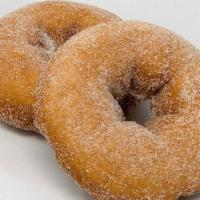Cinnamon Sugar Cake Donut · Our plain cake donuts covered in cinnamon and sugar. So sweet and sugary you'll have to lick...