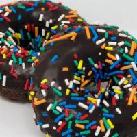 Chocolate Sprinkle Cake Donut · Our chocolate cake donut with chocolate icing and sprinkles, need we say more?