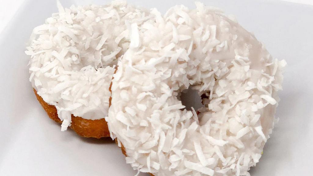 Coconut Cake Donut · Our plain cake donut with a white glaze and coconut on top. You might need a pineapple danish to go with this one!