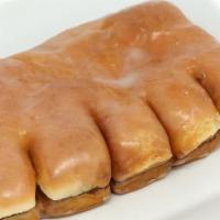 Bear Claw · Apple cinnamon filled yeast dough covered in glaze. Don't worry it won't bite!