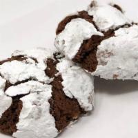 Chocolate Krinkle Cookie · A chocolate brownie like cookie with pecans and then rolled in powdered sugar. Simply deligh...