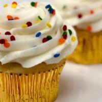 Sprinkled Cupcake - Vanilla · You can never go wrong with a traditional cupcake! Our moist vanilla cake with our white but...