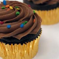 Sprinkled Cupcake - Chocolate · Great for anyone who loves chocolate! Our decadent chocolate cake with our chocolate butterc...