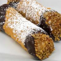 Cannoli · Crispy shell filled with sweetened cream cheese with both ends dipped in chocolate and pecan...