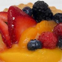 Fruit Tart · Small pie shell with custard filling topped in fresh fruit and an apricot glaze. These are r...