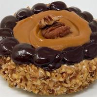 Mini Cheesecakes - Turtle · No bake type cheesecake with pecans around the sides then topped in chocolate and caramel.