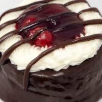 Black Forest Miniature · Chocolate cake covered in our chocolate ganache and topped with cherries.