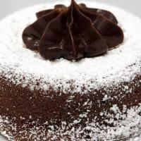 Molten Chocolate Cake · A rich, gooey chocolate center lays in the middle of this moist chocolate cake just waiting ...