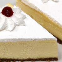 Cheesecake Slice - Vanilla · Traditional New York style cheesecake topped with whipped cream.