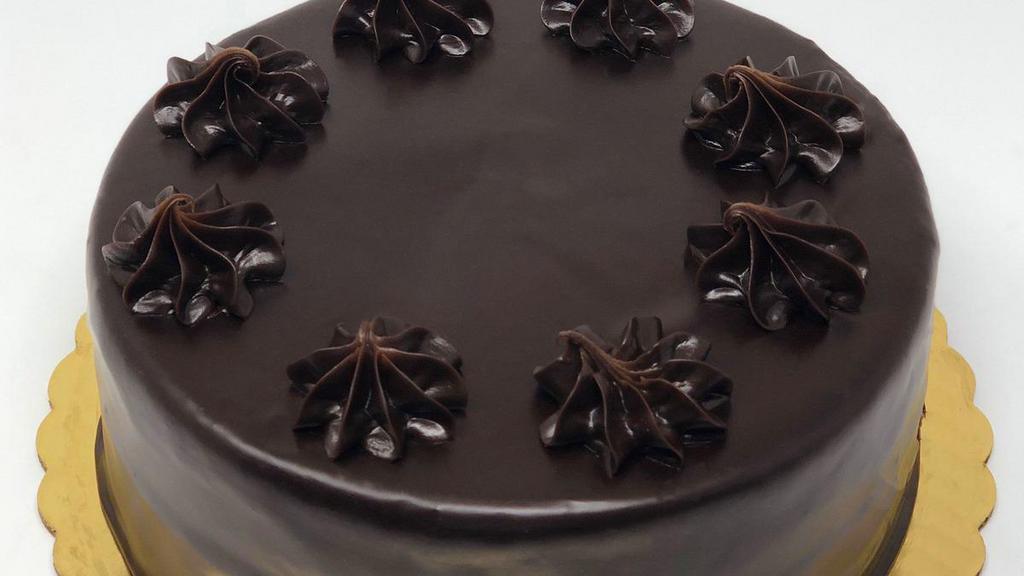 Ganache Cake · 2 layers of chocolate cake with raspberry filling and ganache icing, also available in a 6