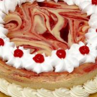 Strawberry Swirl Cheesecake · New York style cheesecake with strawberry filling swirled in. A perfect combination that you...