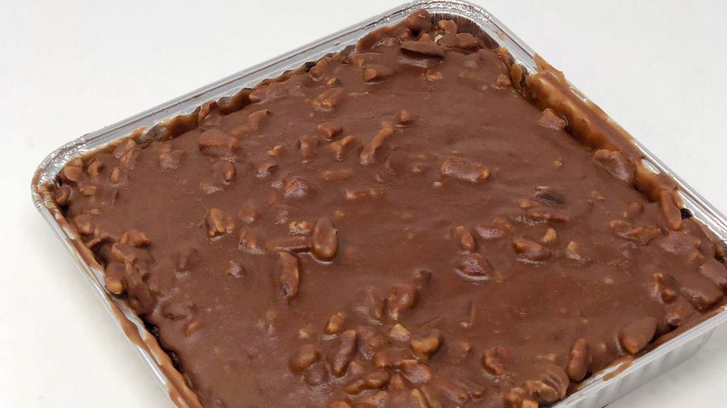 Coke Snack Cake · A chocolate brownie type cake made with coca cola in the batter and iced in a chocolate pecan icing. One of the favorites that you won't be able to stay out of! Baked in an 8x8 container and will serve appox. 9 people.