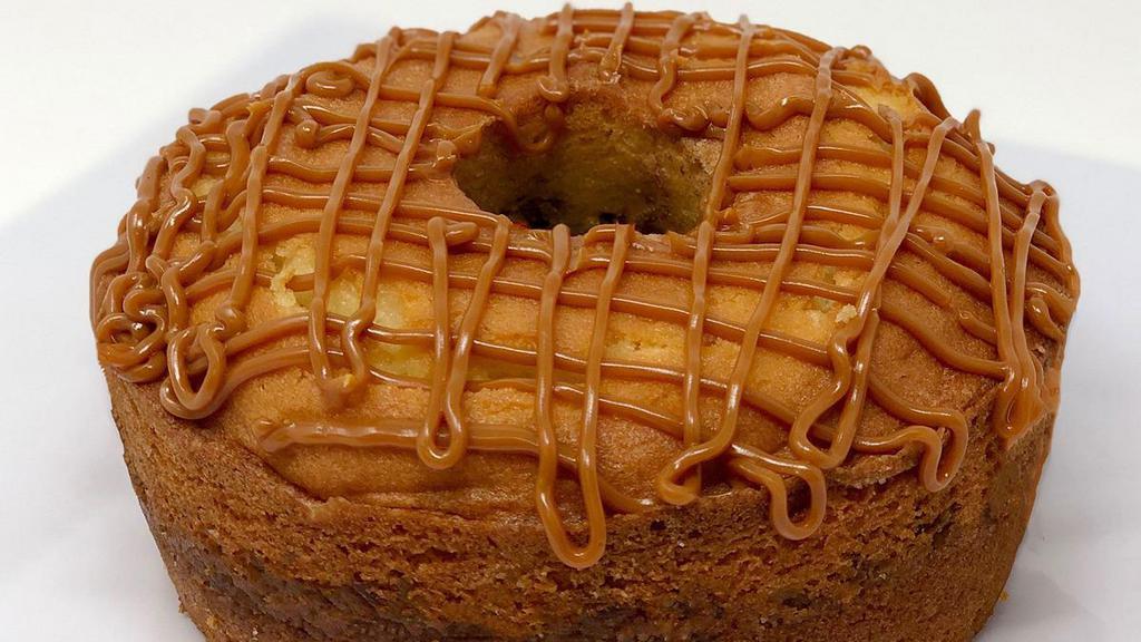 Cinnamon Streusel Cake · A bundt cake with a pecans and cinnamon swirled in and topped with caramel and pecans.
